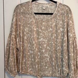 Vintage Havana Neutral Leopard-Print Drawstring Sweatshirt with 3/4 sleeve.